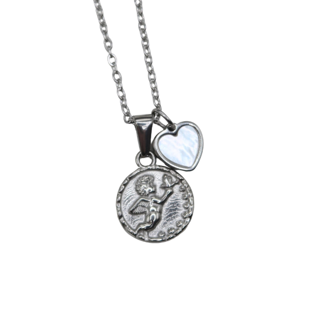 Silver necklace with a circle cherub pendant and a smaller heart charm on a chain